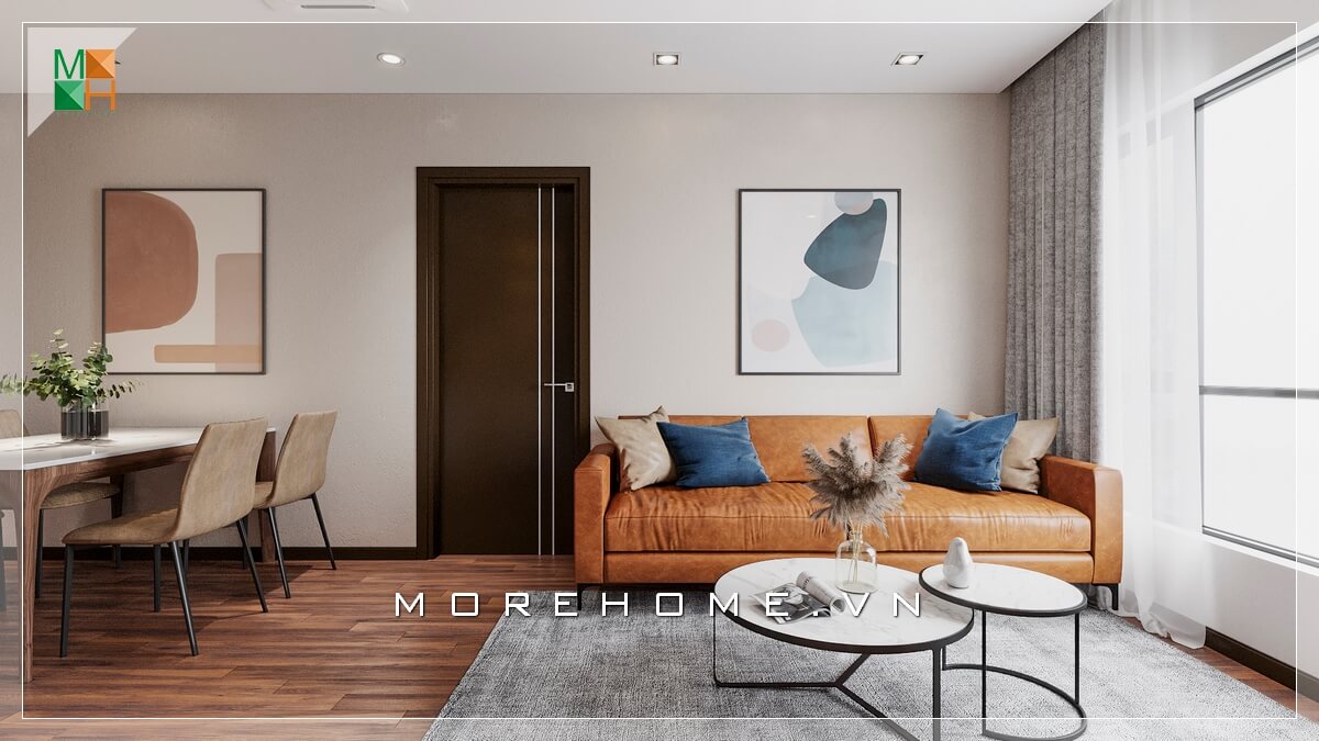 Giới thiệu mẫu ghế sofa bọc da bò nổi bật phù hợp với không gian phòng khách chung cư đơn giản, kết hợp mẫu bàn độc đáo 2 mặt tròn chồng lên nhau khiến căn phòng khách trở nên hiện đại và sang trọng hơn. Thiết kế nội thất phòng khách biệt thự