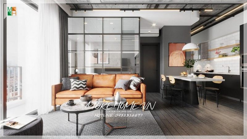Đằng sau chiếc ghế là lớp vách kính trong suốt để ngăn giữa phòng này và phòng khác đón nhận được nhiều ánh sáng tự nhiên nhất.